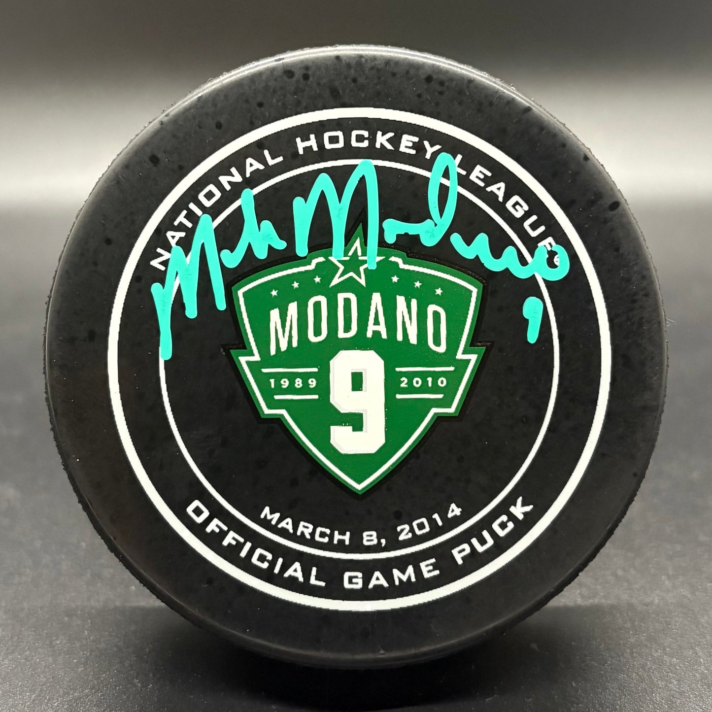 Mike Modano Dallas Stars Number Retirement Autographed Puck (JSA)