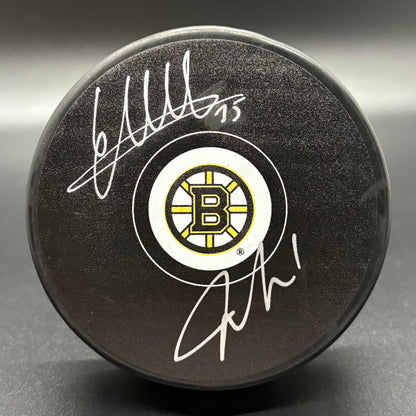 Jeremy Swayman & Linus Ullmark Autographed Puck (Fanatics/JSA)