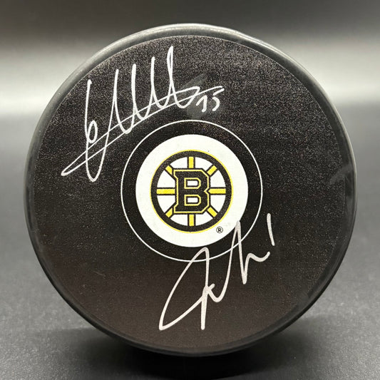 Jeremy Swayman & Linus Ullmark Autographed Puck (Fanatics/JSA)